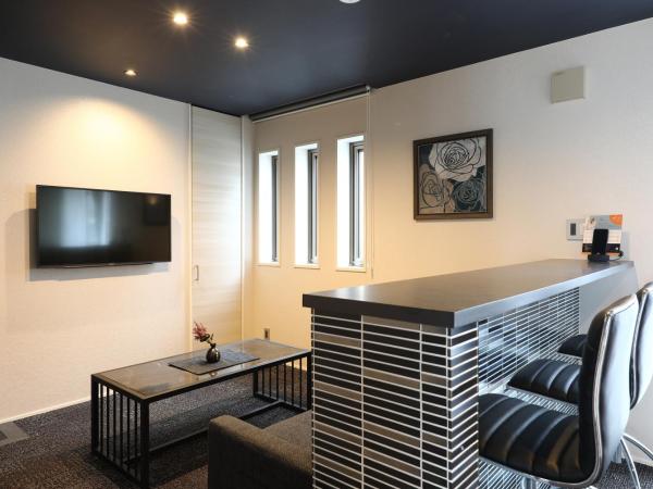 GRAND BASE Hakata City : photo 2 de la chambre suite familiale