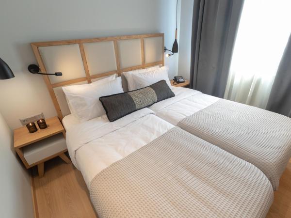 Grand Port Suites : photo 3 de la chambre chambre double ou lits jumeaux standard
