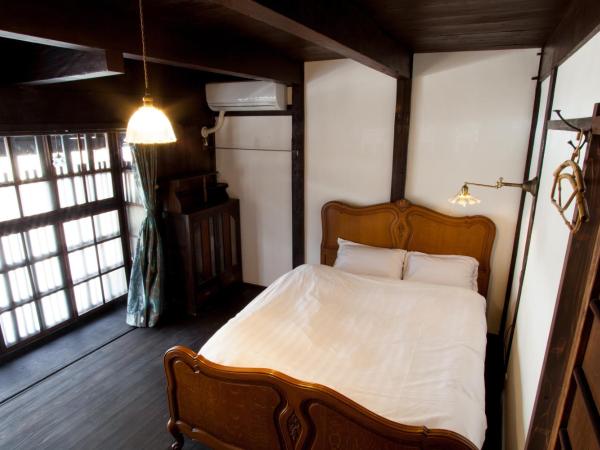 Bed & Breakfast Tsukiya : photo 1 de la chambre chambre double avec salle de bains commune