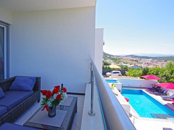 Villa Inis : photo 3 de la chambre suite lit queen-size – vue sur mer