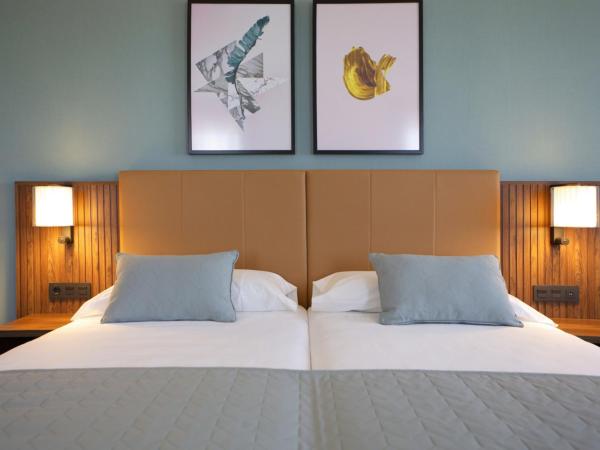 Riu Plaza España : photo 1 de la chambre chambre lits jumeaux familiale de luxe