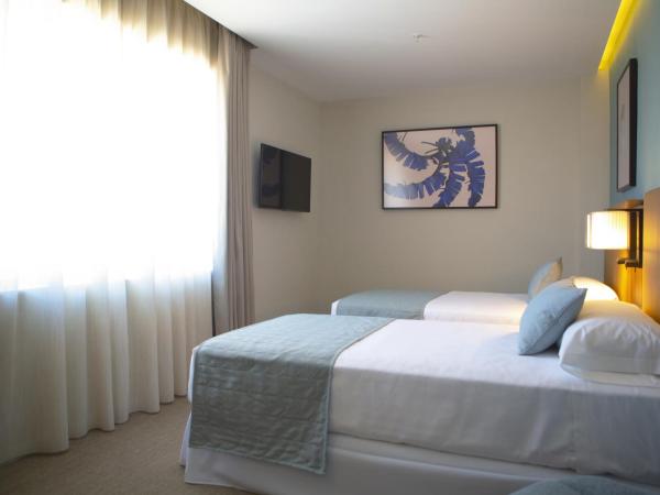 Riu Plaza España : photo 9 de la chambre chambre lits jumeaux de luxe