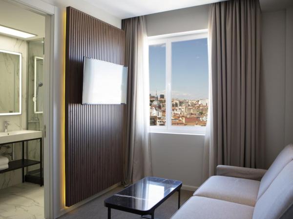 Riu Plaza España : photo 2 de la chambre chambre lits jumeaux familiale de luxe