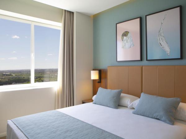 Riu Plaza España : photo 2 de la chambre chambre familiale de luxe lit king-size