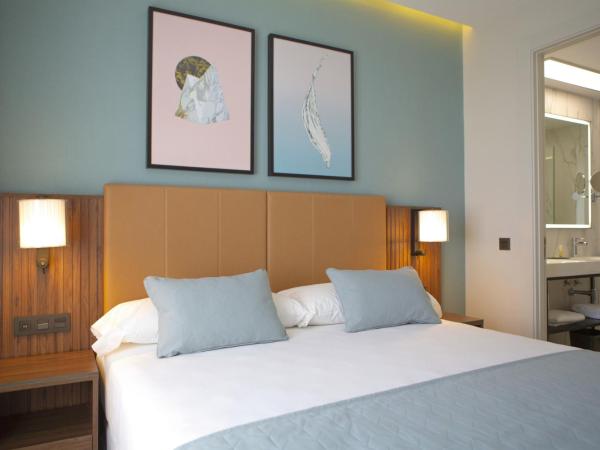 Riu Plaza España : photo 1 de la chambre chambre familiale de luxe lit king-size