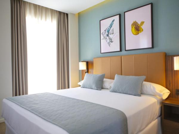 Riu Plaza España : photo 1 de la chambre chambre lit king-size supérieure deluxe avec terrasse