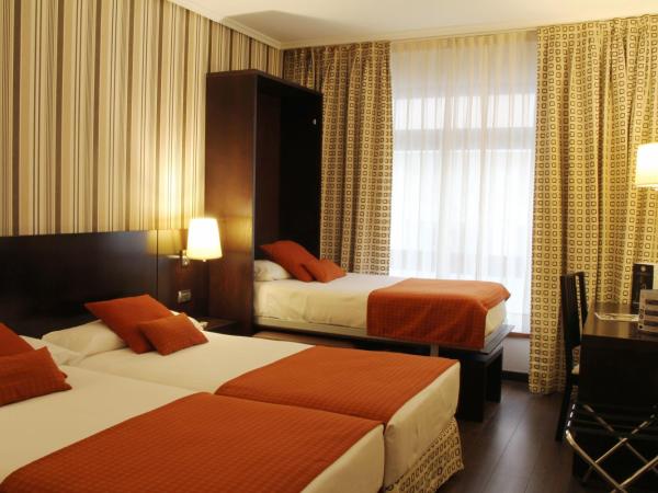 Hotel Conde Duque Bilbao : photo 2 de la chambre chambre triple classique
