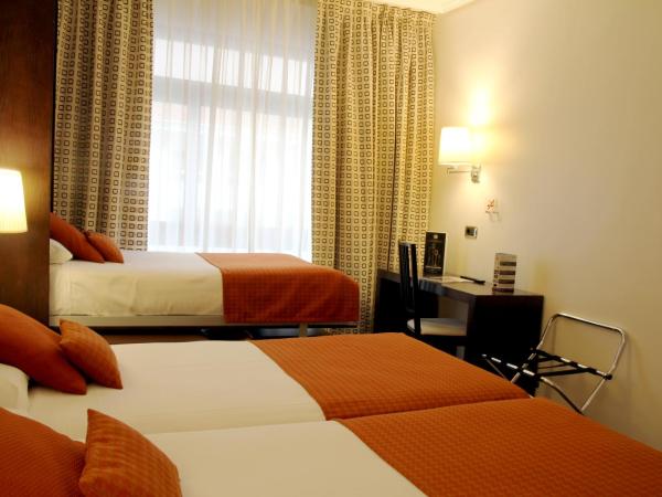 Hotel Conde Duque Bilbao : photo 3 de la chambre chambre triple classique