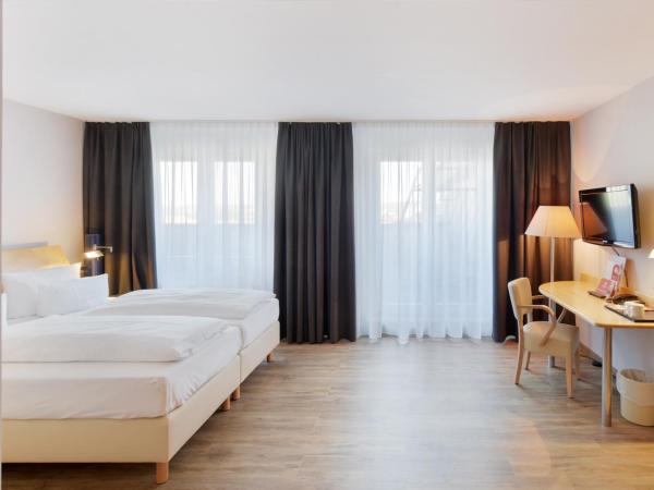 Amedia Dresden Elbpromenade, Trademark Collection by Wyndham : photo 3 de la chambre chambre salon plus