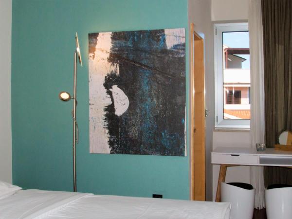 Villa Andrea : photo 4 de la chambre chambre double - vue sur jardin