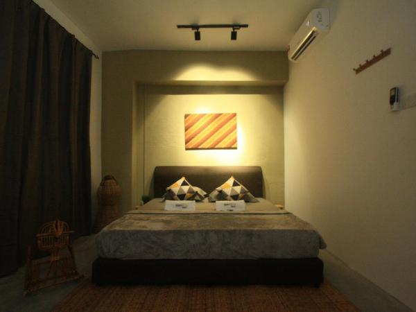 Hornbill's Nest Kuching : photo 3 de la chambre chambre lit king-size supérieure