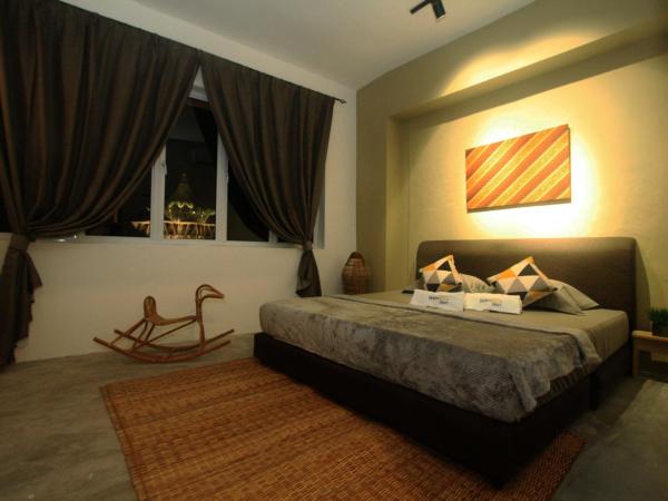 Hornbill's Nest Kuching : photo 1 de la chambre chambre lit king-size supérieure