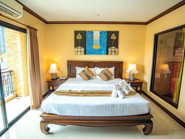 The LD Pattaya Hotel : photo 1 de la chambre chambre double ou lits jumeaux standard avec balcon