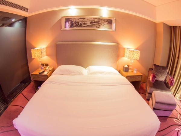 La Perle International Hotel - Free shuttle between hotel and Exhibition Center during Canton Fair & Exhibitor registration Counter : photo 4 de la chambre chambre supérieure lit queen-size