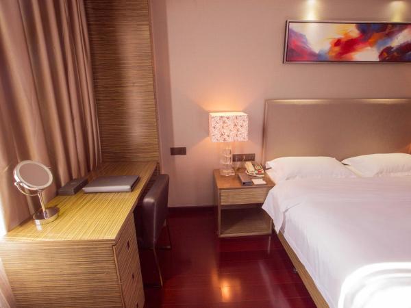 La Perle International Hotel - Free shuttle between hotel and Exhibition Center during Canton Fair & Exhibitor registration Counter : photo 5 de la chambre suite familiale deluxe