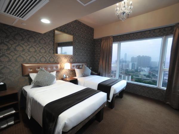 Ramada Hong Kong Grand : photo 1 de la chambre chambre lits jumeaux premium