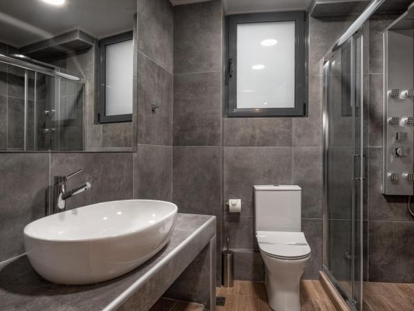 Pallada Athens boutique rooms & apartments : photo 7 de la chambre suite lit king-size