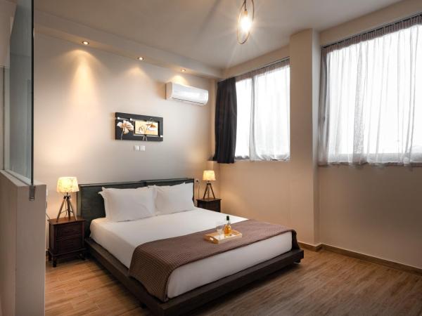Pallada Athens boutique rooms & apartments : photo 3 de la chambre suite lit king-size