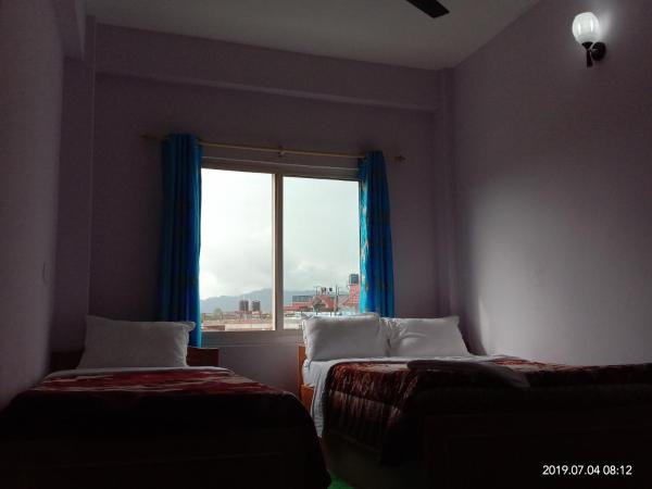 Hotel Aarjan And Restaurant : photo 5 de la chambre chambre deluxe double ou lits jumeaux