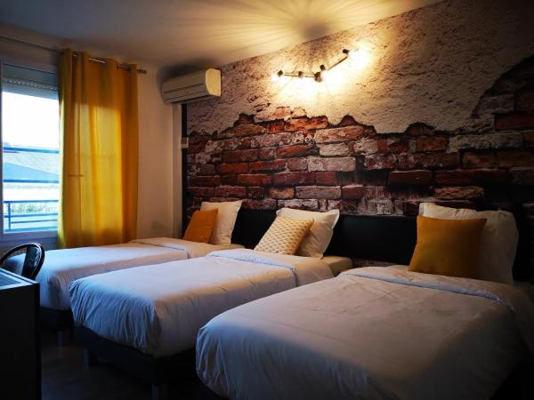 Hôtel Bar Brasserie L'ESCALE : photo 3 de la chambre chambre triple