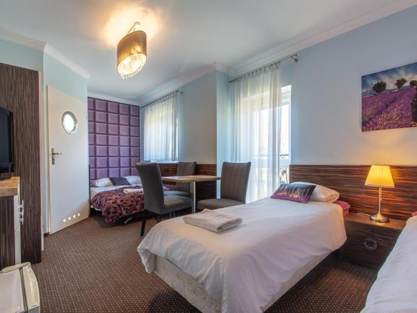 Villa 33 Blisko Plaży : photo 2 de la chambre chambre quadruple