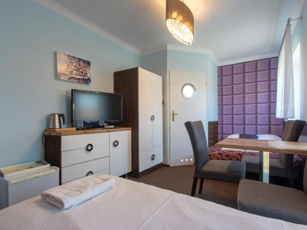 Villa 33 Blisko Plaży : photo 4 de la chambre chambre quadruple