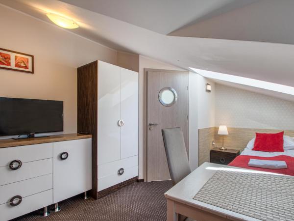 Villa 33 Blisko Plaży : photo 2 de la chambre chambre triple Économique