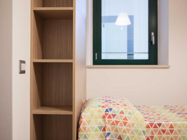 Ostello Alfieri 2 : photo 5 de la chambre lit dans dortoir pour femmes de 6 lits