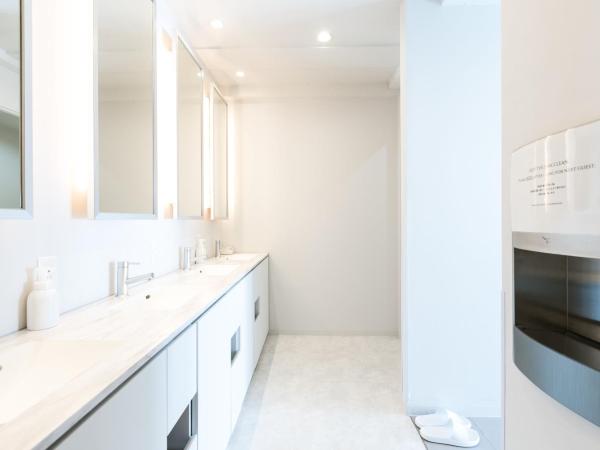 TSUKIMI HOTEL : photo 5 de la chambre chambre capsule dans dortoir mixte