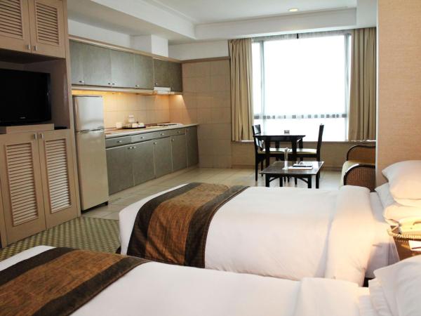 Pacific Regency Hotel Suites : photo 3 de la chambre chambre lits jumeaux deluxe