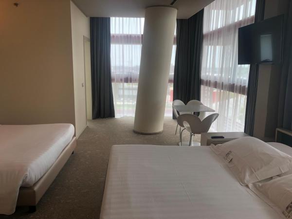 Best Western Plus Net Tower Hotel Padova : photo 9 de la chambre chambre lit queen-size confort avec canapé-lit