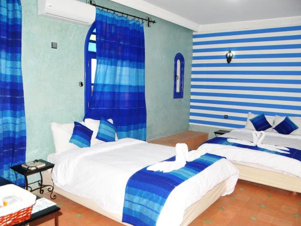 Riad Mhidou : photo 4 de la chambre chambre quadruple avec salle de bains privative