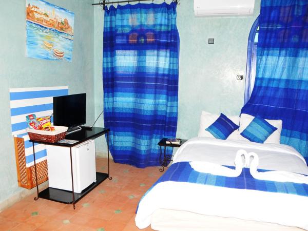 Riad Mhidou : photo 6 de la chambre chambre quadruple avec salle de bains privative