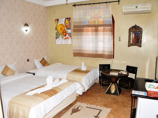 Riad Mhidou : photo 1 de la chambre chambre triple avec salle de bains privative