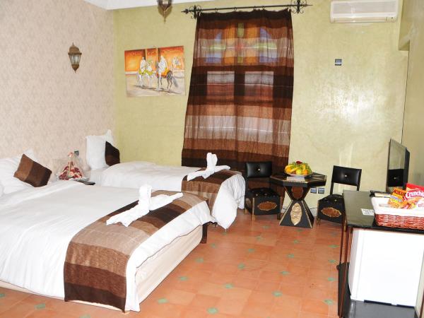 Riad Mhidou : photo 6 de la chambre chambre triple avec salle de bains privative