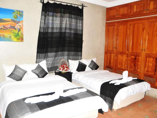 Riad Mhidou : photo 10 de la chambre chambre triple avec salle de bains privative