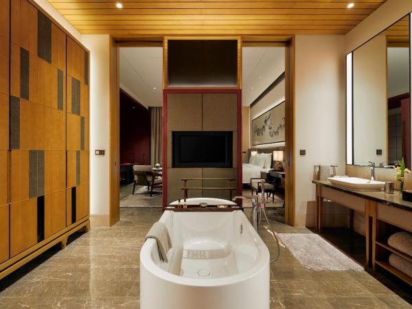 Capella Tufu Bay, Hainan : photo 2 de la chambre hébergement lit king-size premium - côté océan