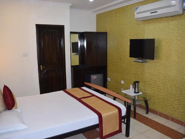 Lilypool - The Heritage Jalmahal : photo 5 de la chambre chambre double ou lits jumeaux deluxe supérieure