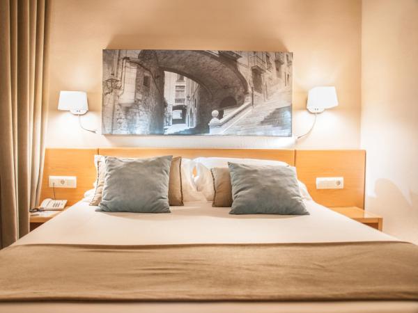 Hotel Costabella : photo 1 de la chambre chambre quadruple