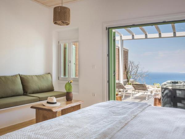 KLIDON Dreamy Living Suites : photo 3 de la chambre suite avec jacuzzi