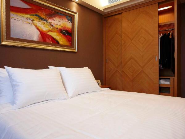 Dan Executive Hotel Apartment Zhujiang New Town : photo 1 de la chambre appartement de caractère 2 chambres - 2 petits-déjeuners