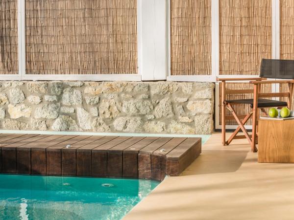 KLIDON Dreamy Living Suites : photo 2 de la chambre suite avec piscine privée