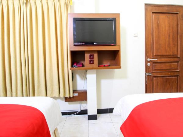 RedDoorz plus @ Tegal Panggung : photo 8 de la chambre chambre familiale