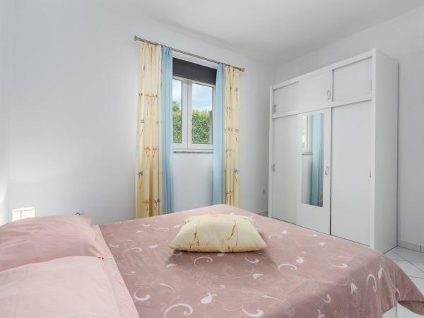 Apartments Baldini : photo 3 de la chambre appartement - vue sur jardin