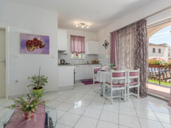 Apartments Baldini : photo 9 de la chambre appartement - vue sur jardin