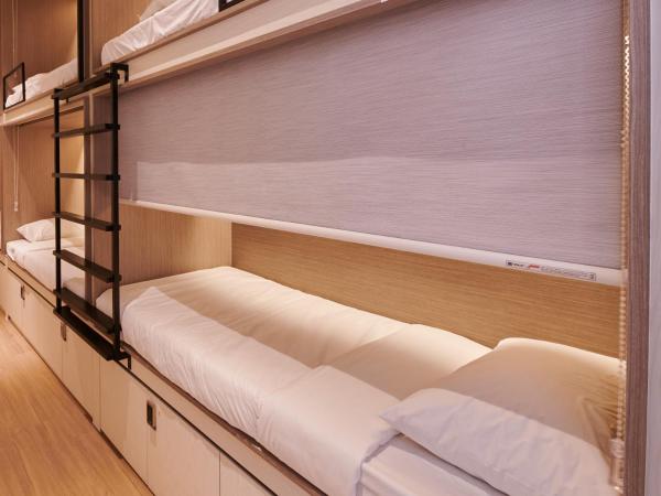 BEAT. Sports Hostel : photo 2 de la chambre capsule simple dans dortoir mixte