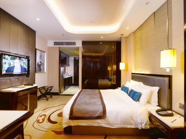 Pacific Regency Hotel Suites : photo 1 de la chambre suite de luxe premier lit king-size