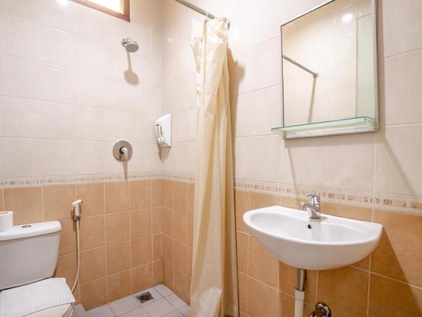 LeGreen Suite Setiabudi : photo 1 de la chambre chambre double supérieure