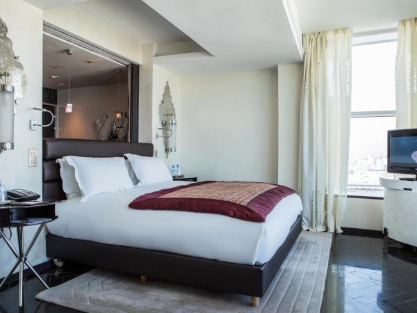 Sofitel Casablanca Tour Blanche : photo 7 de la chambre suite lit king-size impériale avec salon et salle à manger séparés