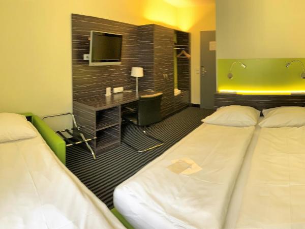 Behringers City Hotel Nürnberg : photo 3 de la chambre chambre triple standard avec petit lit double